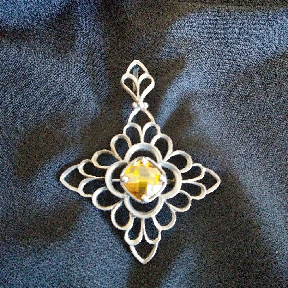 Silpada pendant and pin.